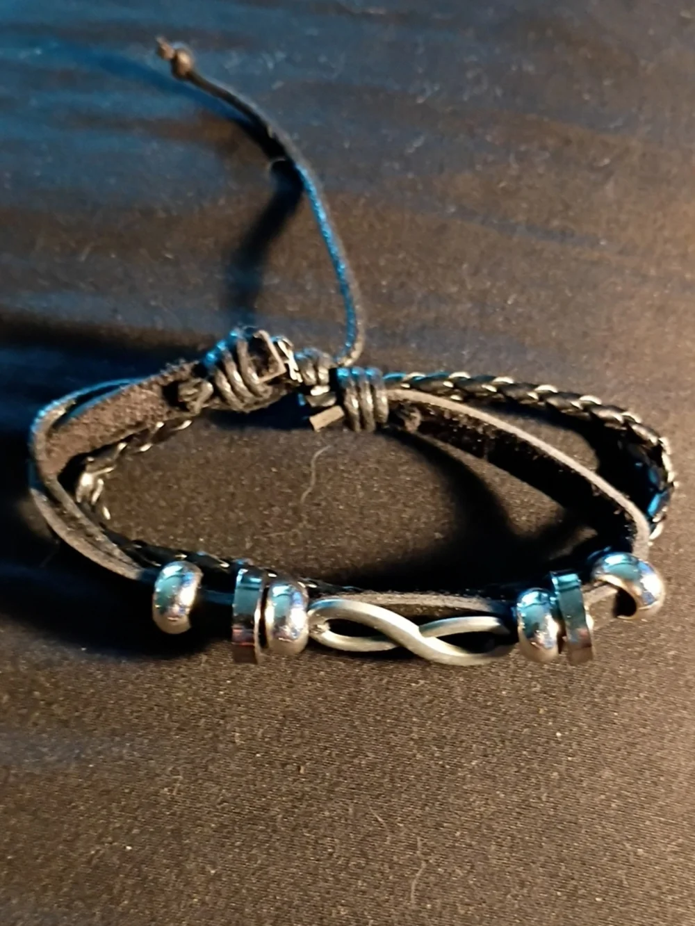 Black Leather Infinity Bracelet with Silver Accents